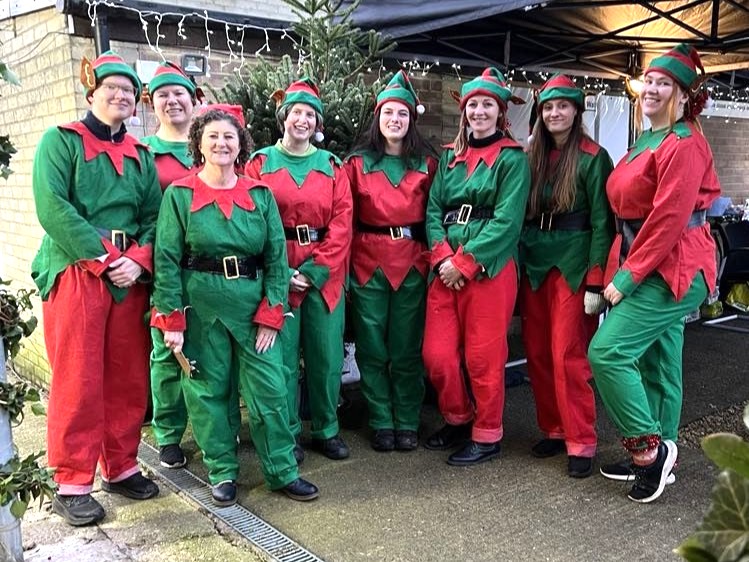 Our team dressed as elves for the Fesive Fayre